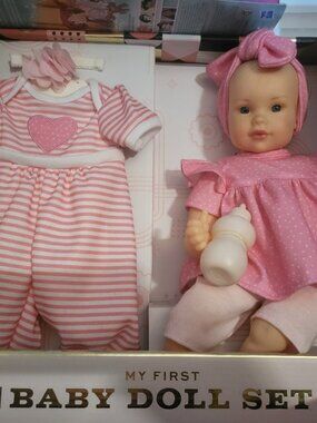 FAO SCHWARTZ BABY DOLL WITH ACCESSORIES